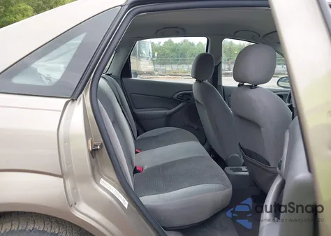 2003 Ford Focus Lx z USA, uszkodzony, nr VIN 1FAFP33PX3W167800